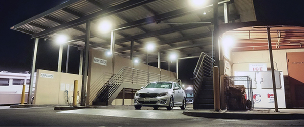 Illuminated RV storage service area at night